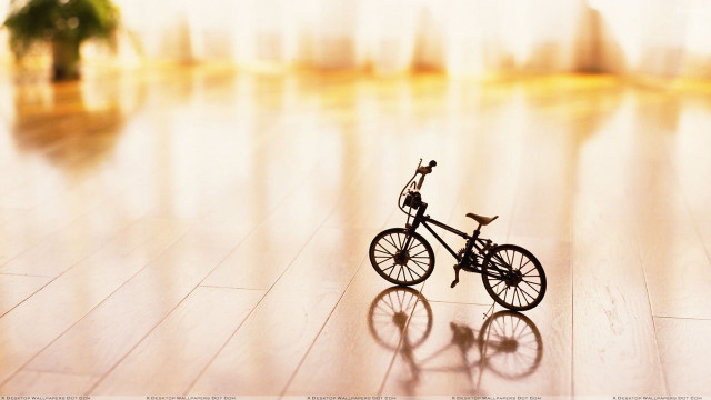 Toy bike wooden floor room free wallpaper for desktop - medium preview image