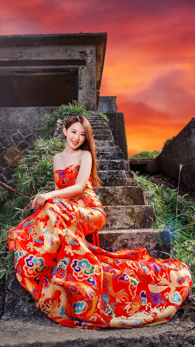 Red dress sitting portrait sunset free wallpaper for mobile - medium preview image