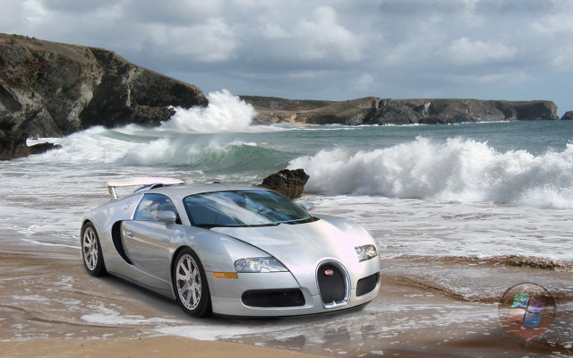 Silver car beach ocean rocks free wallpaper for desktop - medium preview image