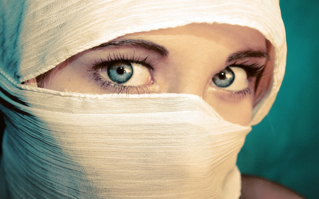 Surprised woman bandage head eyes free wallpaper for desktop - medium preview image
