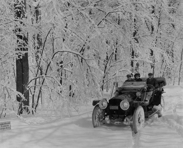 Vintage car snow covered forest free wallpaper for desktop - medium preview image