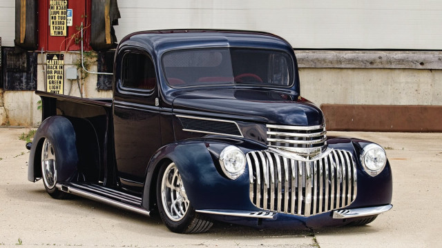 Classic car parked building sign free wallpaper for desktop - medium preview image