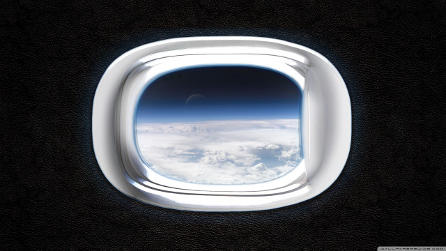 Airplane window clouds sky earth free wallpaper for desktop - medium preview image