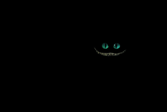 Black background green face glowing free wallpaper for desktop - medium preview image