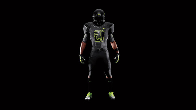 Football player neon green shoes free wallpaper for desktop - medium preview image