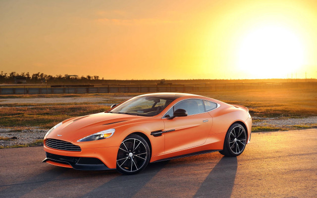 Orange sports car sunset desert free wallpaper for desktop - medium preview image