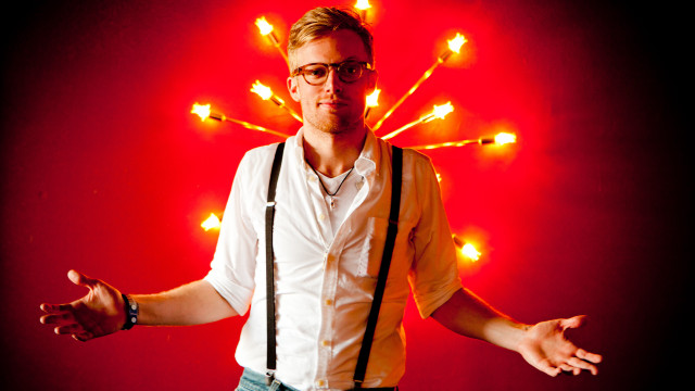 Man glasses suspenders red background free wallpaper for desktop - medium preview image