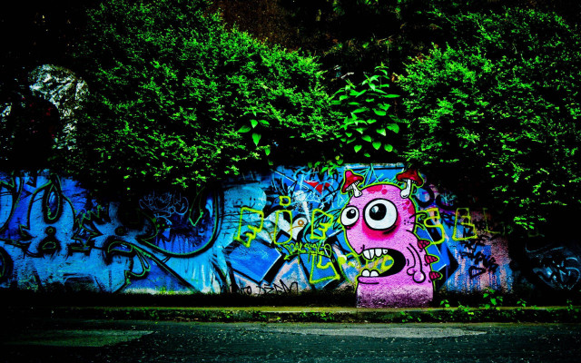 Graffiti covered face bush green #2 free wallpaper for desktop - medium preview image