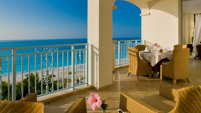 Balcony wicker furniture ocean view free wallpaper for desktop - medium preview image