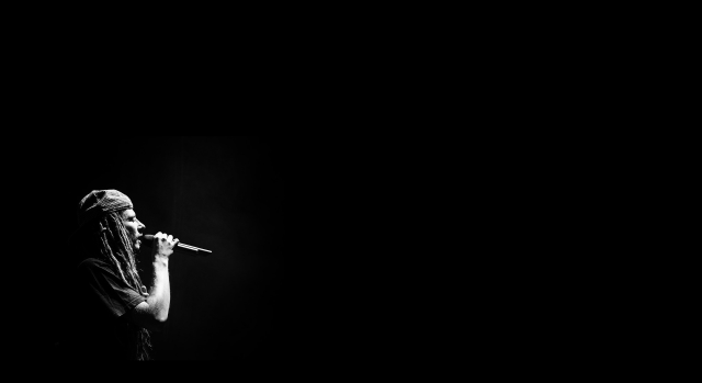 Woman microphone stage dark black free wallpaper for desktop - medium preview image