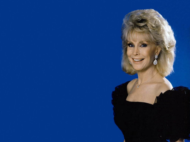 Woman black dress smiling blue free wallpaper for desktop - medium preview image