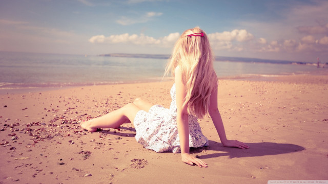Woman beach hair blowing wind #2 free wallpaper for desktop - medium preview image