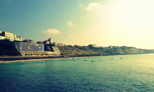 Beach large building people swimming free wallpaper for desktop - medium preview image