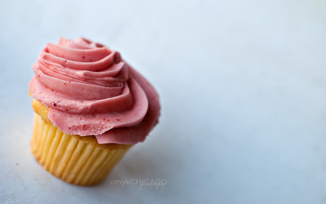 Cupcake pink frosting white surface #2 free wallpaper for desktop - medium preview image
