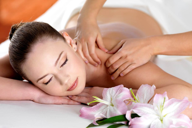 Woman back massage spa flowers free wallpaper for desktop - medium preview image