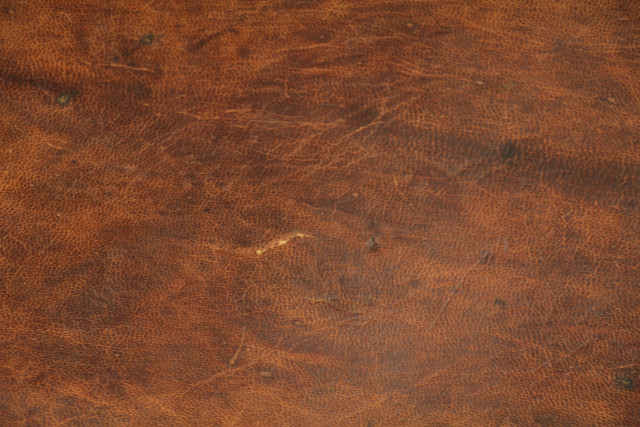 Brown leather texture dirt patch free wallpaper for desktop - medium preview image
