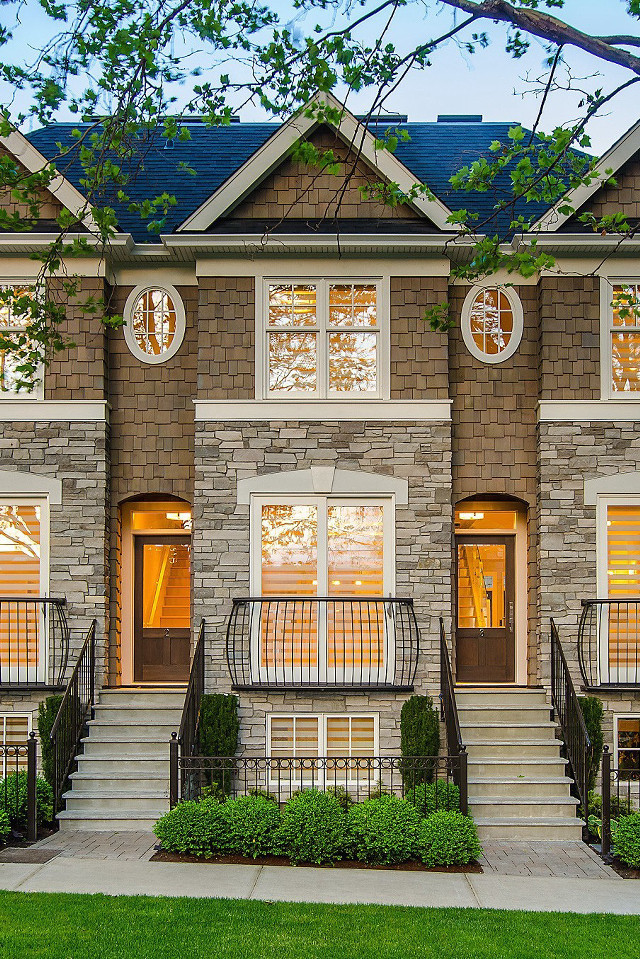 Brick houses with clocks front free wallpaper for mobile - medium preview image