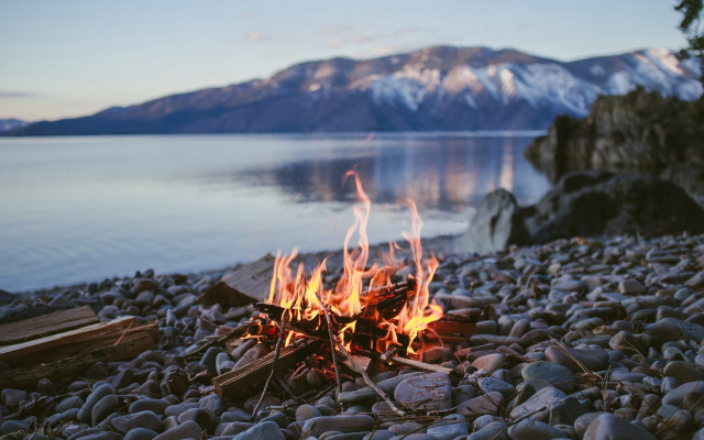 Campfire rocky beach lake mountains #2 free wallpaper for desktop - medium preview image