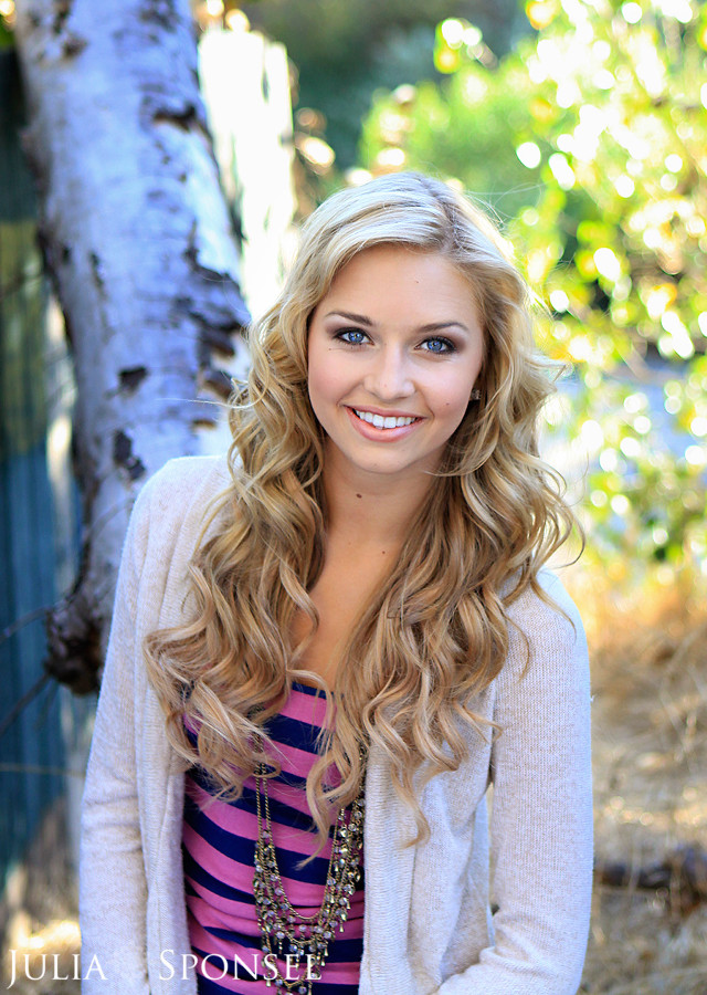 Woman blonde hair striped shirt free wallpaper for mobile - medium preview image