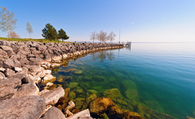 Water rocks dock grassy area free wallpaper for desktop - medium preview image