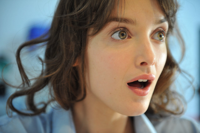 Surprised woman toothbrush mouth expression #2 free wallpaper for desktop - medium preview image