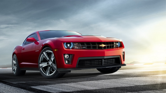 Red chevrolet camaro driving road free wallpaper for desktop - medium preview image