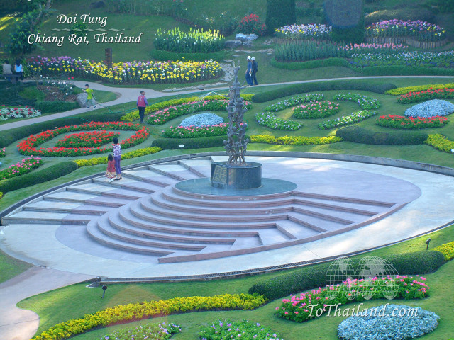 Garden fountain flowers people walking free wallpaper for desktop - medium preview image