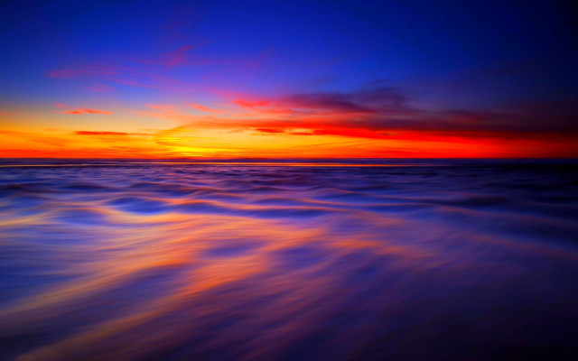 Sunset ocean wave shore red free wallpaper for desktop - medium preview image