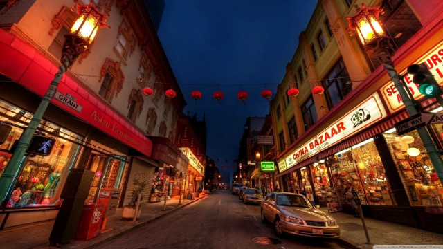 Car parked street storefront night free wallpaper for desktop - medium preview image