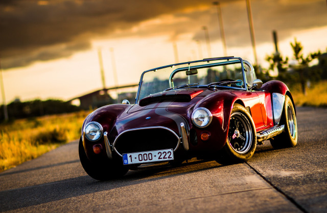 Red sports car sunset cloudy #5 free wallpaper for desktop - medium preview image
