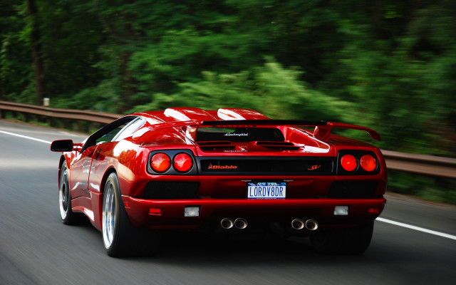 Red sports car driving road #8 free wallpaper for desktop - medium preview image