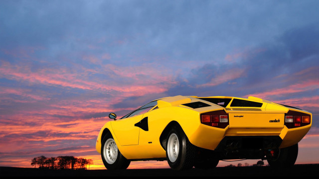 Yellow sports car field sunset free wallpaper for desktop - medium preview image