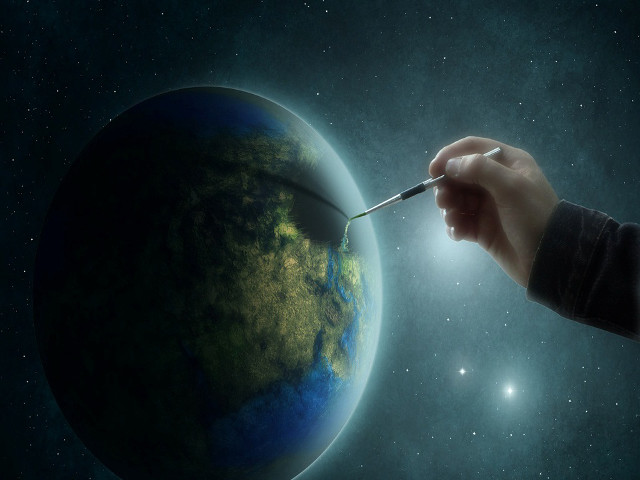 Hand holding paintbrush planet stars free wallpaper for desktop - medium preview image