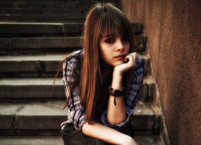 Woman sitting steps hand chin free wallpaper for desktop - medium preview image