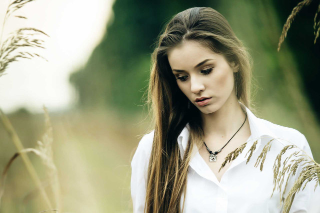 Woman long hair field cellphone free wallpaper for desktop - medium preview image