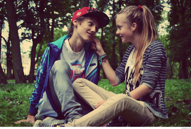 Boy girl sitting ground talking free wallpaper for desktop - medium preview image