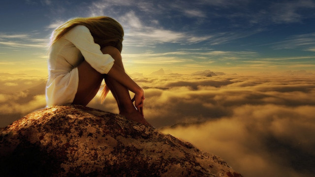 Woman sitting rock clouds head free wallpaper for desktop - medium preview image