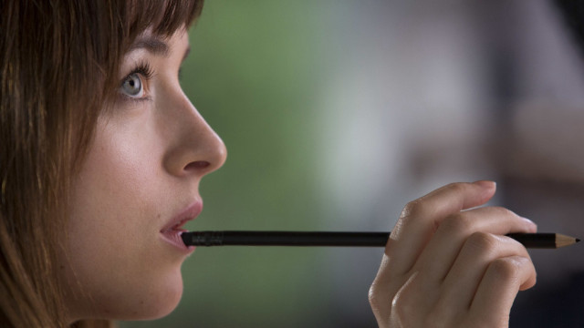 Woman holding pencil mouth surprised free wallpaper for desktop - medium preview image