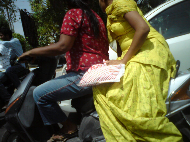 Woman yellow dress man motorcycle free wallpaper for desktop - medium preview image