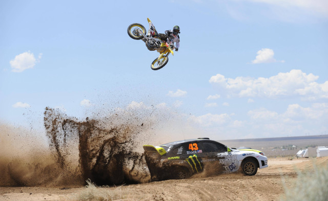 Motorcycle jump car dirt sky free wallpaper for desktop - medium preview image
