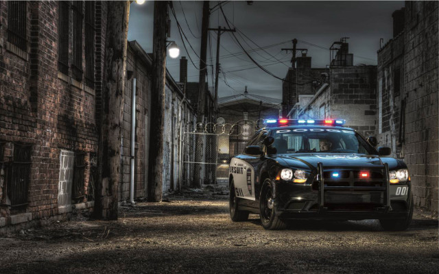 Police car dark alley night free wallpaper for desktop - medium preview image