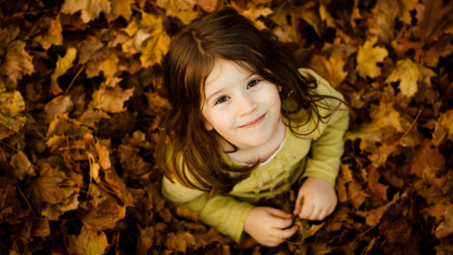 Little girl leaves smiling autumn #2 free wallpaper for desktop - medium preview image
