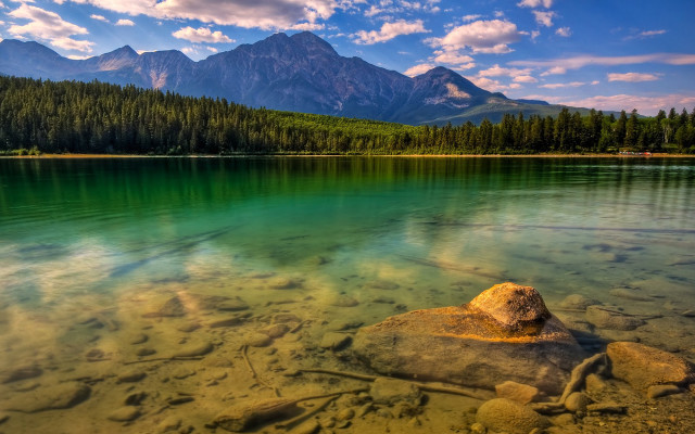 Lake rock mountains background clouds free wallpaper for desktop - medium preview image