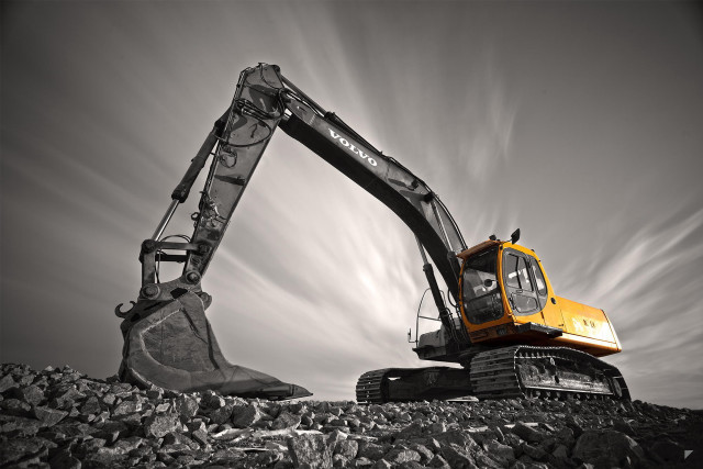 Yellow black excavator rocky hill free wallpaper for desktop - medium preview image