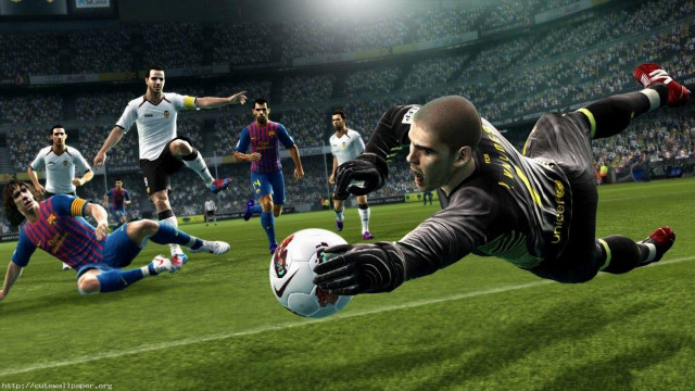 Man diving soccer ball game #2 free wallpaper for desktop - medium preview image