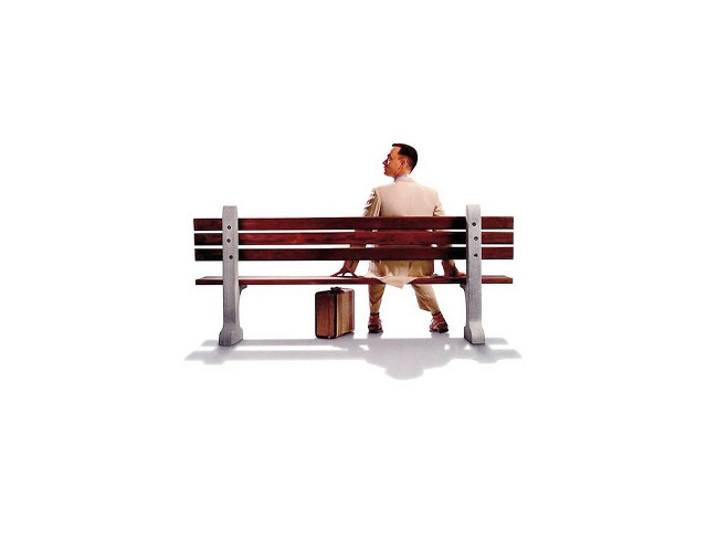 Man sitting bench suitcase hand free wallpaper for desktop - medium preview image