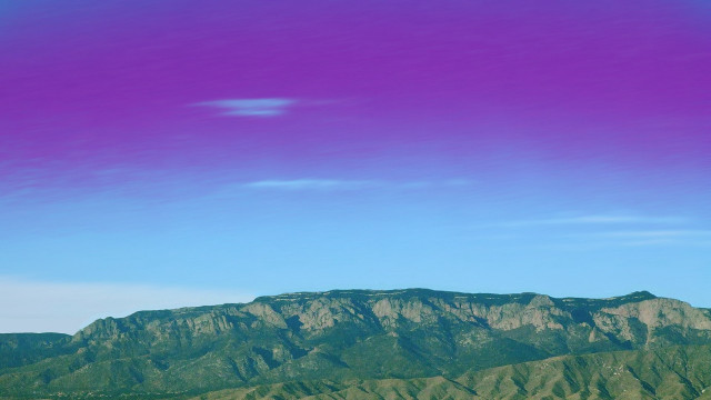 Mountain purple sky plane distant free wallpaper for desktop - medium preview image