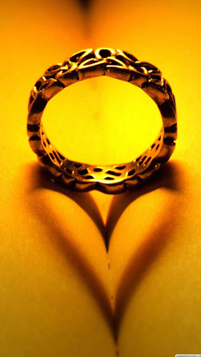 Heart shadow ring yellow background free wallpaper for mobile - medium preview image