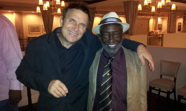 Two men standing room chairs free wallpaper for desktop - medium preview image