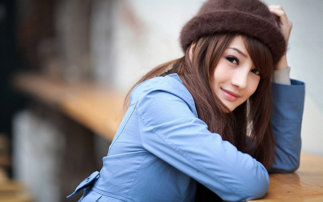Woman bench hat jacket hands free wallpaper for desktop - medium preview image